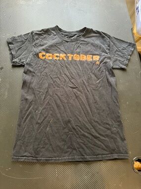Men's Black Graphic Tee with Orange "COCKTOBER" Print size S MEASUREMENTS SHOWN